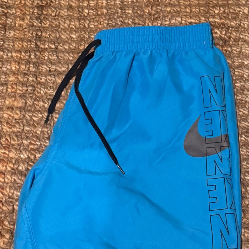 Nike Blue Sports Shorts with Black Logo
